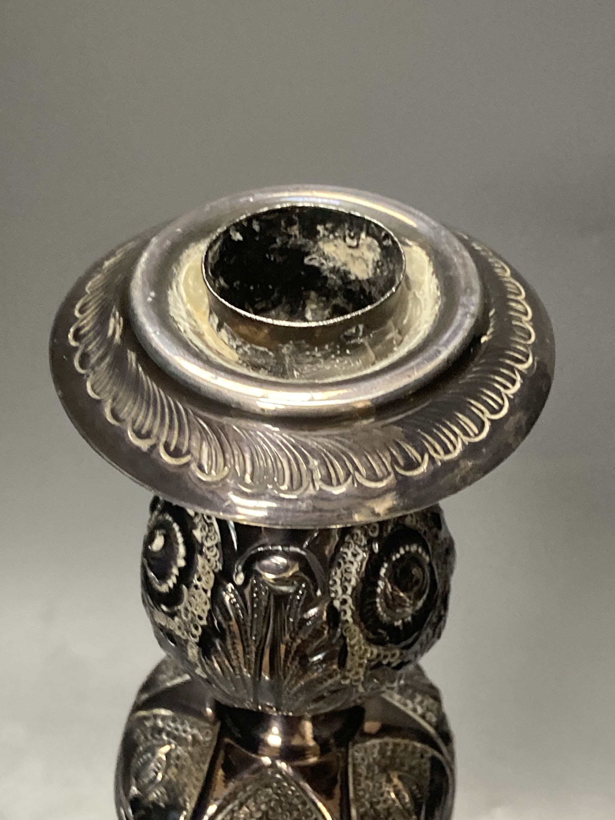 A pair of Edwardian silver Sabbath Day candlesticks, by Rosenzweig & Taitelbaum, London, 1909, 37.5cm, 34oz.